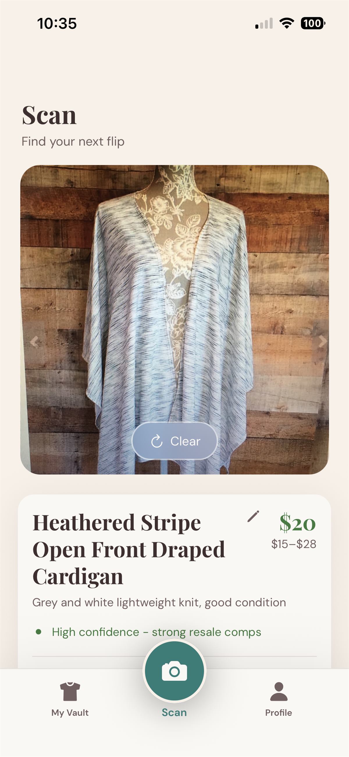 ThriftVault scan result showing a resale price range and confidence indicator for a thrifted item